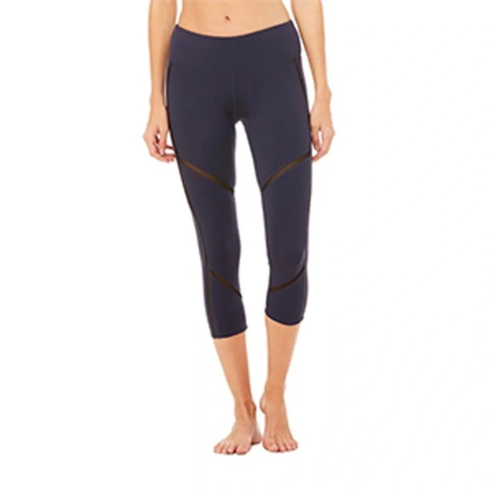 ALO Yoga Continuity Capri Legging In Rich Navy